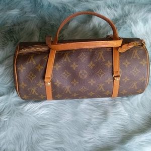 Estee Lauder Small Barrel shaped Navy patterned bag New